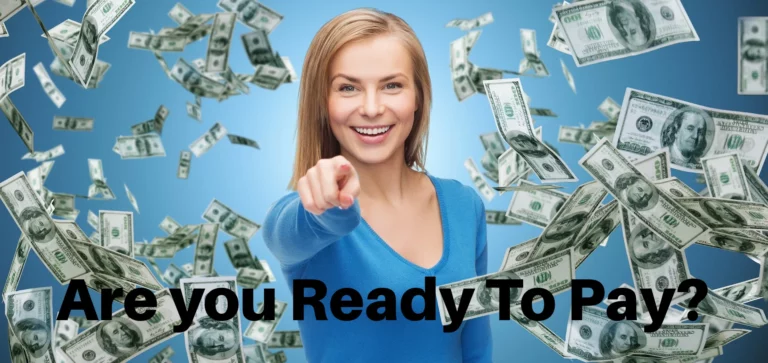 Lady is pointing at you, saying are you ready? Asking if you are ready to pay.
